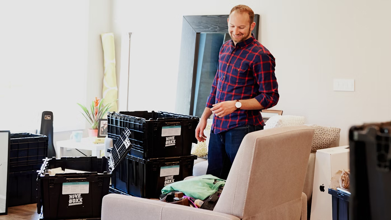person cleaning the clutter
