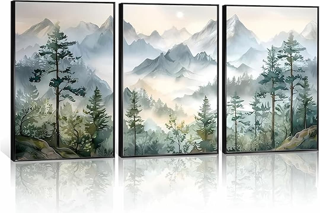 Three-panel wall art of a misty forest and mountain landscape, featuring tall evergreen trees, soft morning light, and distant peaks in cool tones